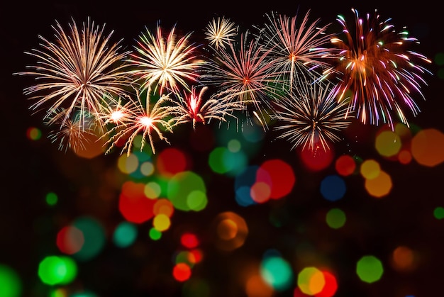 Photo fond de vacances pour noël ou le jour de l'indépendance avec des feux d'artifice. pour votre conception