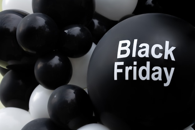 Photo fond de vente vendredi noir, ballons de décoration sombre avec texte de promotion