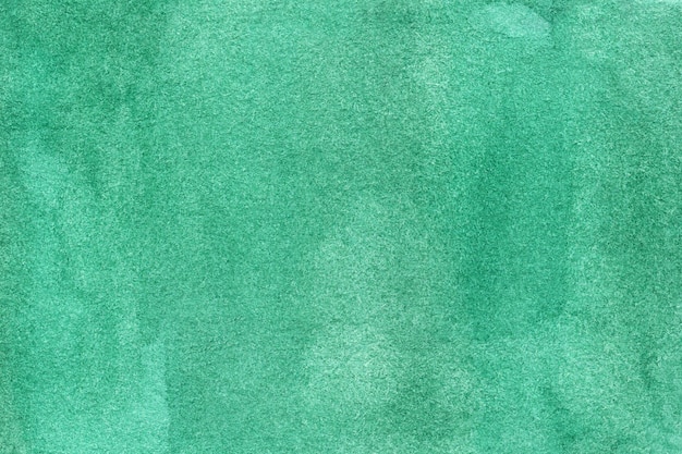 Fond vert aquarelle avec des taches de points de coups de pinceau