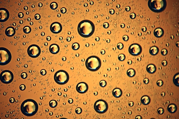 Photo fond vert gouttes de pluie humides pour la superposition sur une fenêtre, météo, fond gouttes d'eau de pluie sur un verre transparent