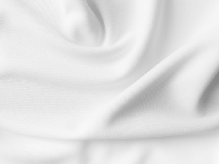 Photo fond de vêtements ondulés abstrait blanc