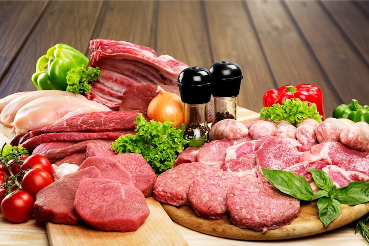 Photo fond de viande crue fraîche avec des légumes