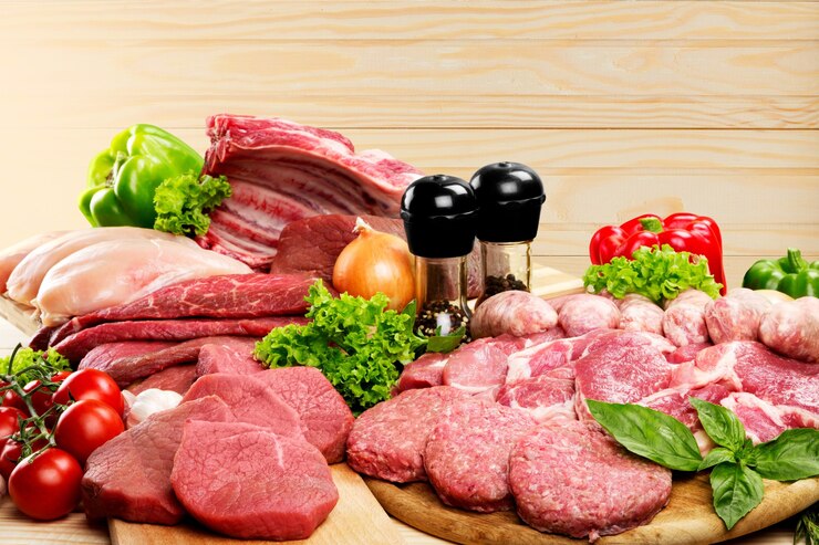Photo fond de viande crue fraîche avec des légumes