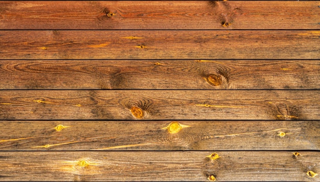 Fond de vieilles planches de pin avec des noeuds Marron avec du jaune