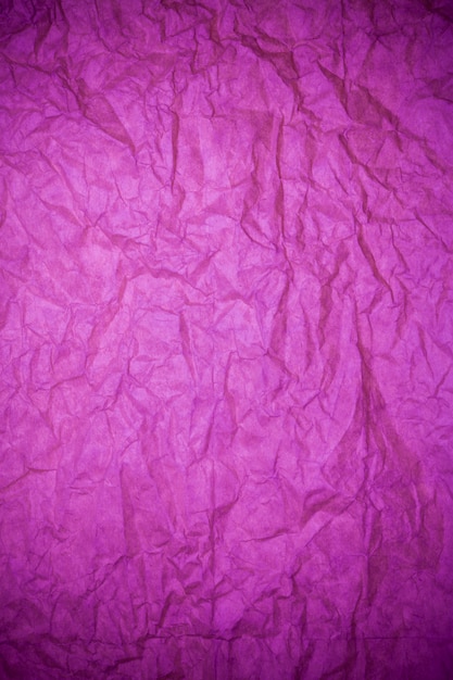 Fond violet papier texturé.