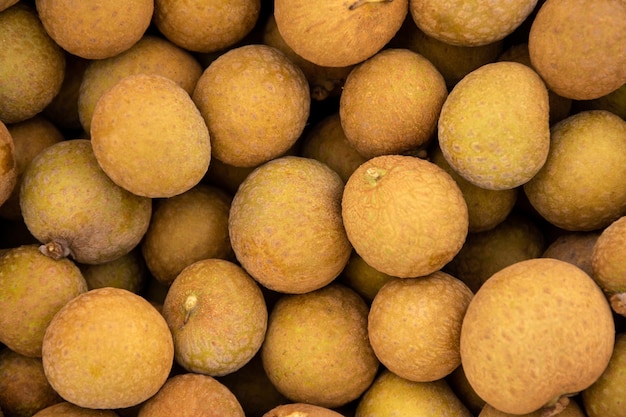 Fond de vue de dessus de fruits longanes.