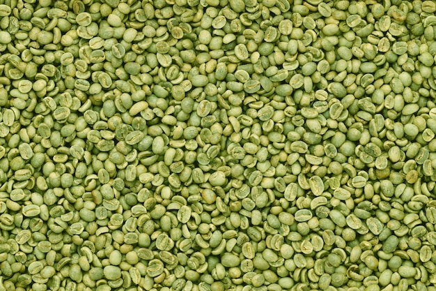 Fond de vue de dessus de grains de café vert