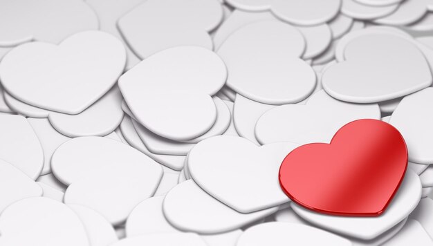 Une forme de coeur rouge sur de nombreux coeurs blancs, symbole de l'amour et de l'événement de la Saint-Valentin