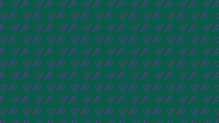 Photo forme de triangle géométrique abstrait coloré sur fond vert