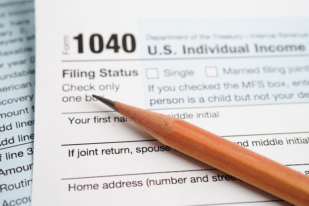 Photo formulaire d'impôt 1040 déclaration de revenus des particuliers aux états-unis concept de financement d'entreprise