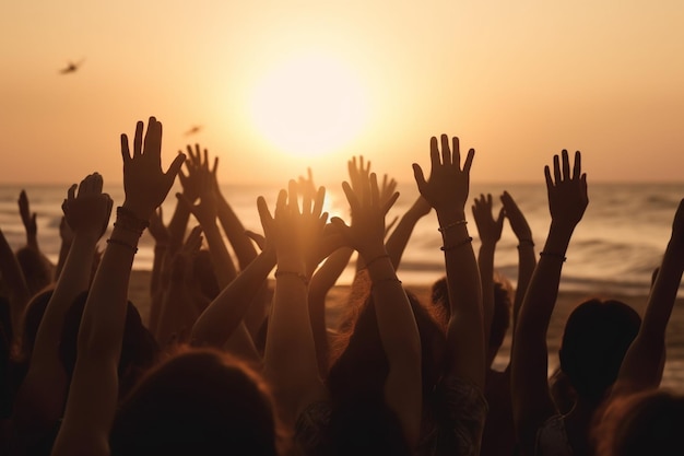 Photo foule enthousiaste avec les mains en l'air image de vacances d'été bokeh les gens s'amusent au coucher du soleil sur une plage ia générative