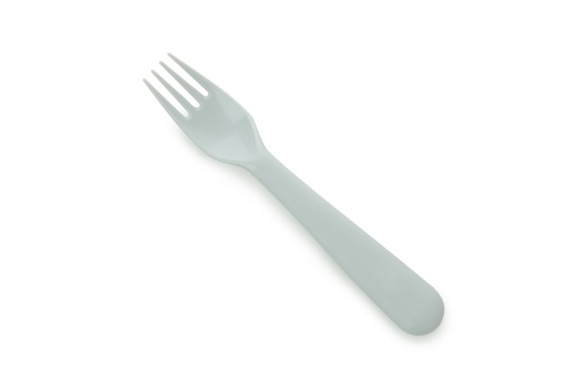 Fourchette en plastique unique isolé sur fond blanc