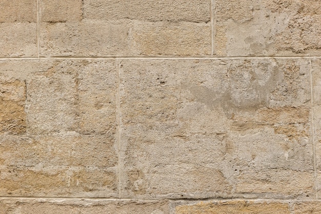 Fragment de mur d'une pierre taillée