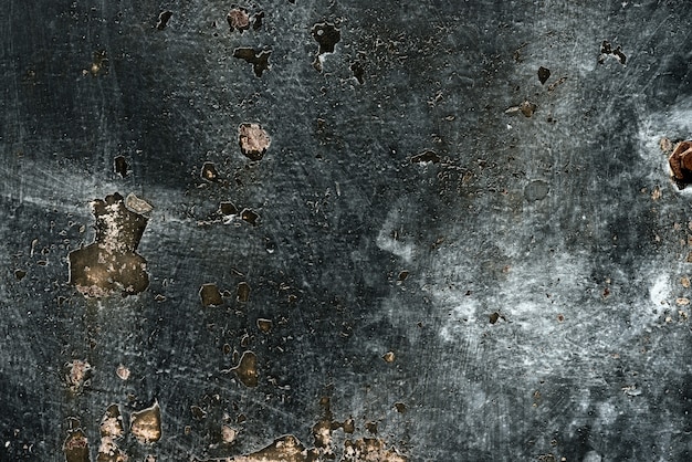 Fragment de mur avec des rayures et des fissures