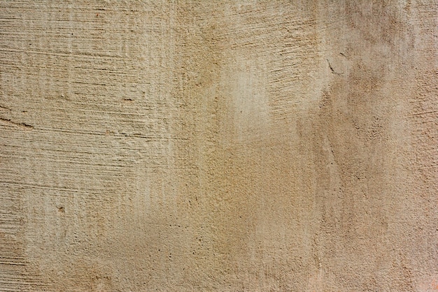 Fragment de mur avec des rayures et des fissures