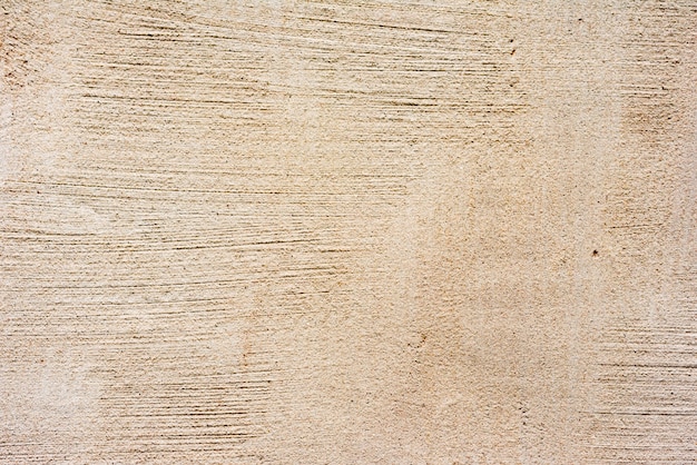 Fragment de mur avec des rayures et des fissures