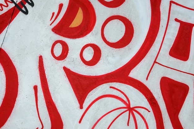 Fragment de peintures de graffitis d'art de rue colorées avec des contours et des ombres de près en arrière-plan