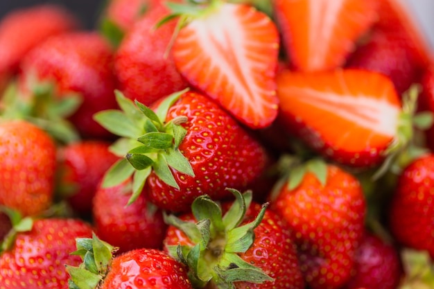 fraise fraise baies biologiques macro fond de fruits concept de nourriture saine en vitamines