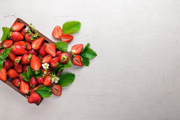 Fraises fraîches Aliments sains Sur fond de bois Vue de dessus Espace libre