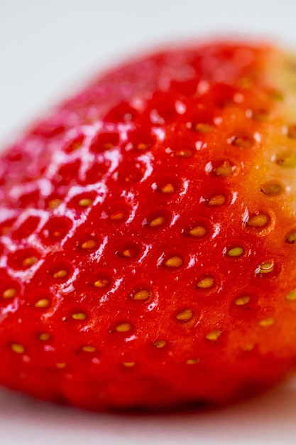 Photo les fraises se bouchent. fraise macro. coup de macro de baies. gros plan de baies. fraise