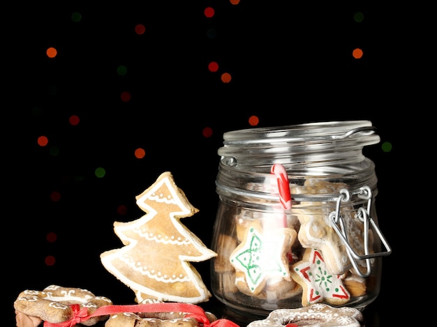 Friandises De Noël En Banque Sur La Surface Des Lumières De Noël