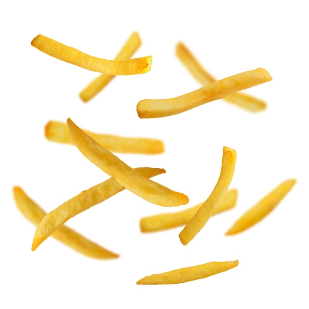 Photo frites savoureuses tombant sur fond blanc