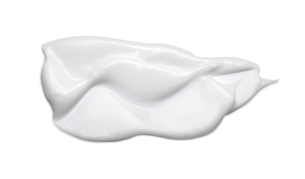 Frottis de crème cosmétique blanche isolé sur blanc