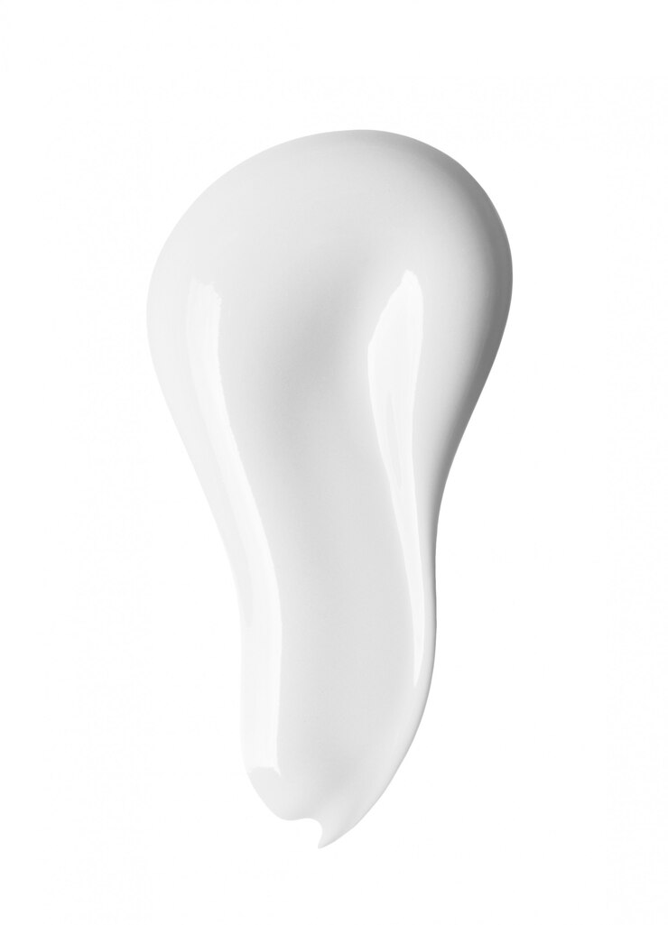 Photo frottis de crème cosmétique blanche isolée