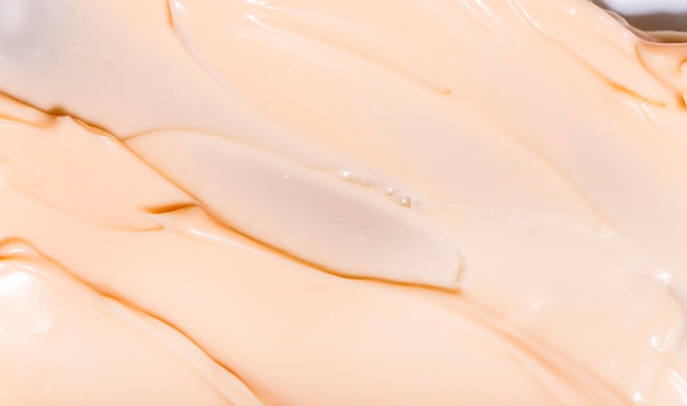 Photo frottis et gouttes cosmétiques. aspect de la texture de la crème, de l'huile et des granulés