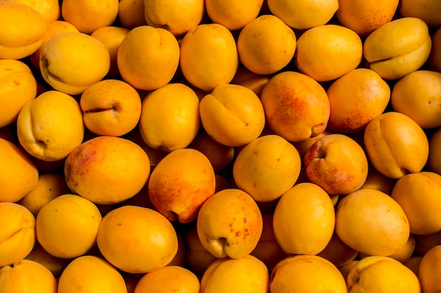 Fruit abstrait jaune abricot frais
