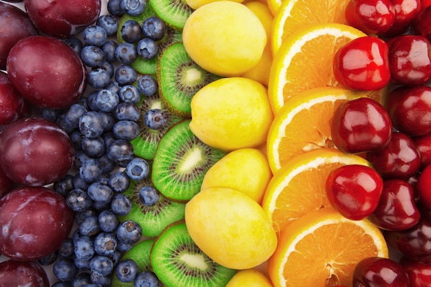 Fruits frais Surface colorée de fruits assortis. Gamme de couleurs