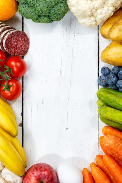 Fruits et légumes collection d'aliments cadre de cuisson format portrait fond vue de dessus