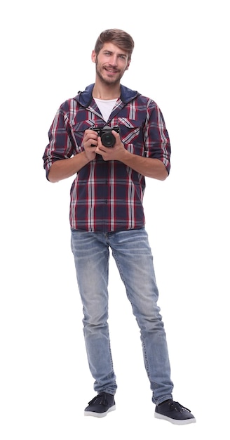 Fulllength un beau jeune homme avec un cameraisolated sur fond blanc