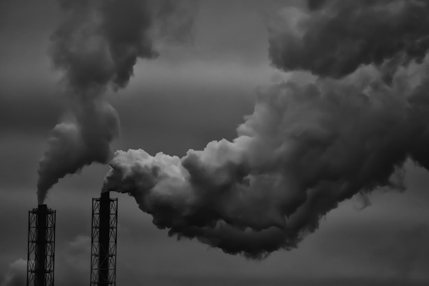 fumée de tuyau d'usine fond gris abstrait, pollution au co2