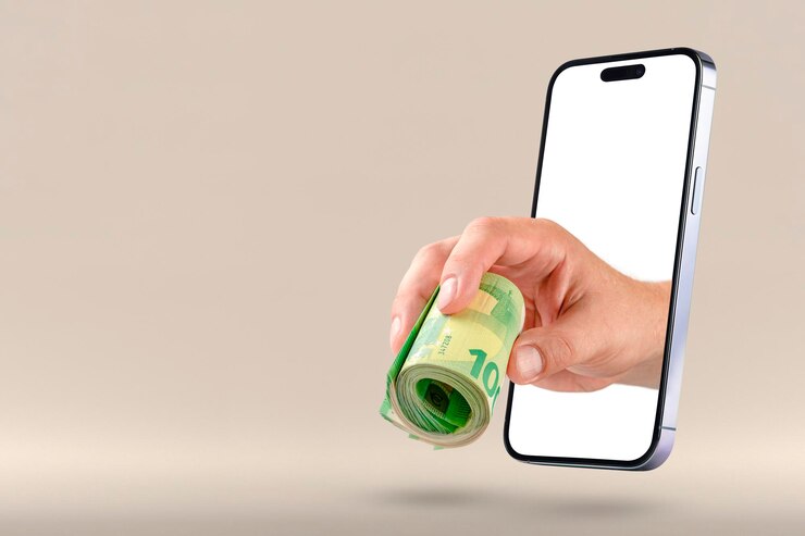 Photo gagner de l'argent sur internet la main tient un rouleau d'argent beaucoup de billets en euros dans la main le han
