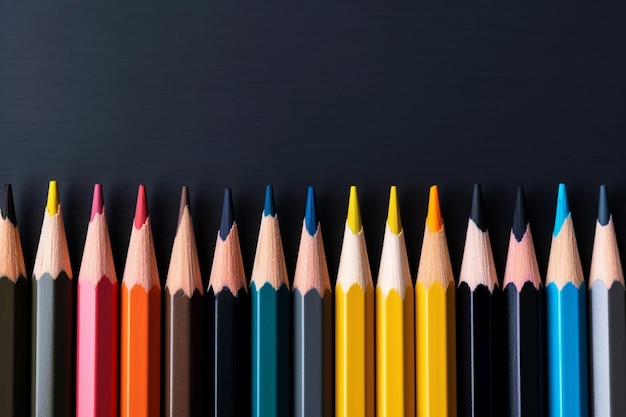 Une gamme vivante de crayons de différentes couleurs sur fond de tableau noir générée par l'IA