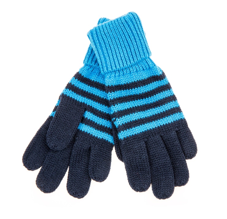 Photo gants de bébé en laine tricotés, sur blanc