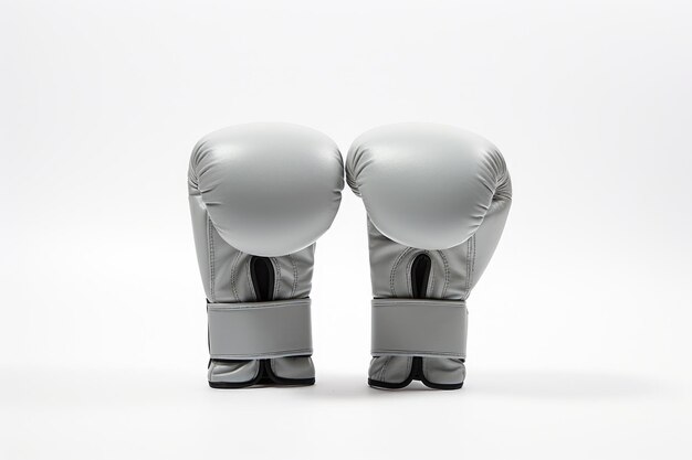 Photo les gants de boxe gris isolés sur un fond blanc