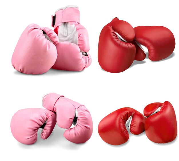 Photo des gants de boxe roses sur un fond flou