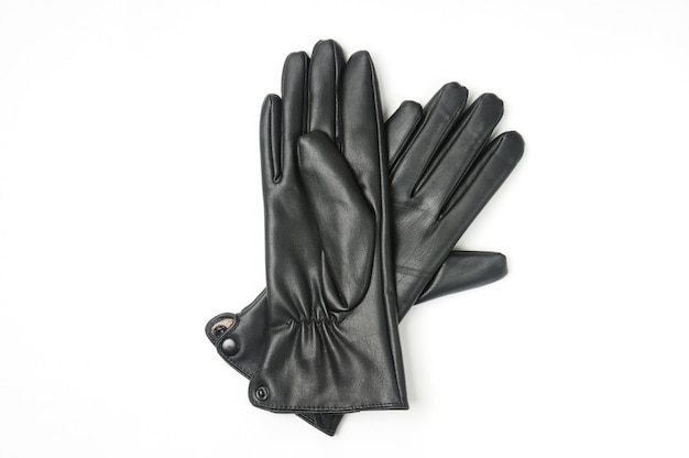 Photo gants en cuir occasionnels sur blanc isolé