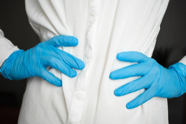Photo gants médicaux bleus à la taille