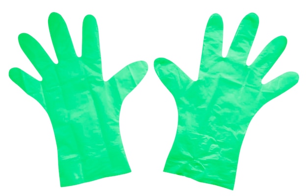 Gants en plastique vert isolé