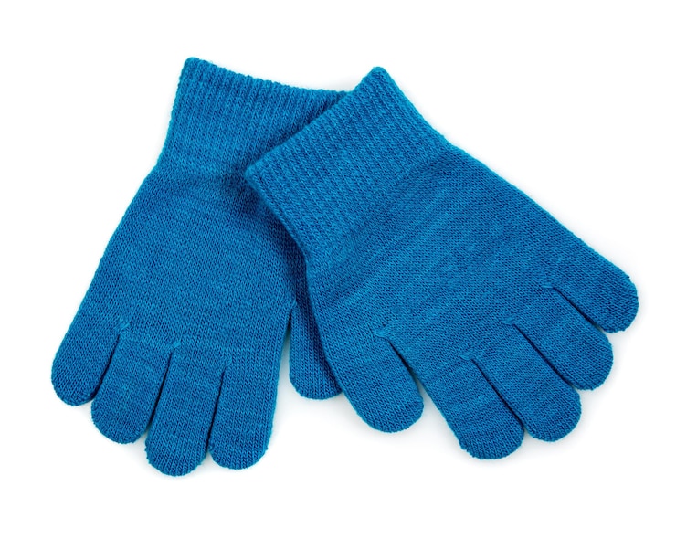 Photo gants en tricot bleu hiver isolés sur fond blanc.