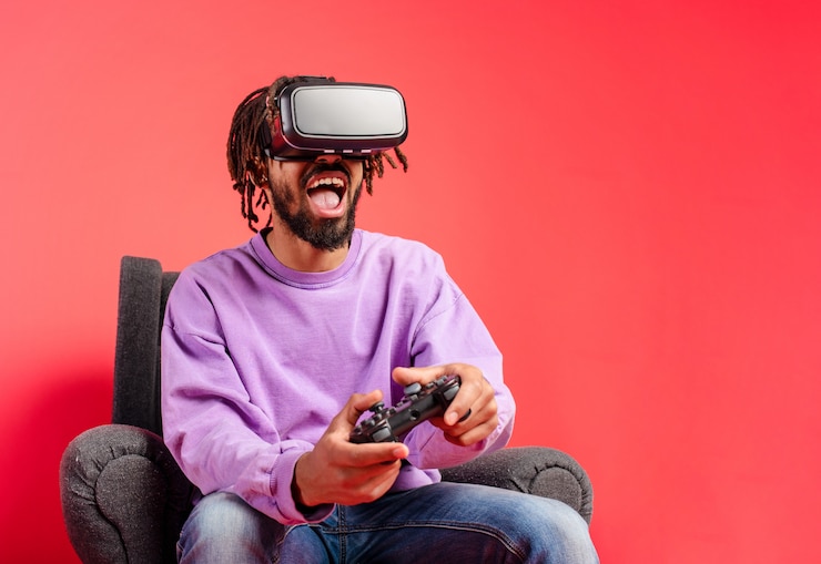 Photo garçon avec des lunettes vr joue avec un jeu vidéo virtuel