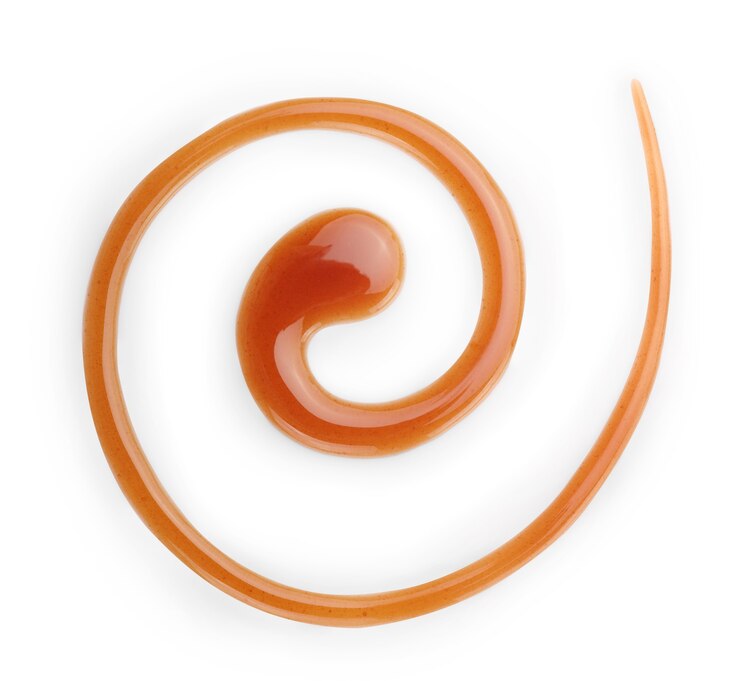 Photo garniture au caramel sucré isolé sur blanc