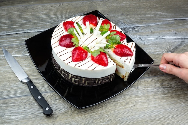 Photo gâteau aux fraises à la crème de vanille