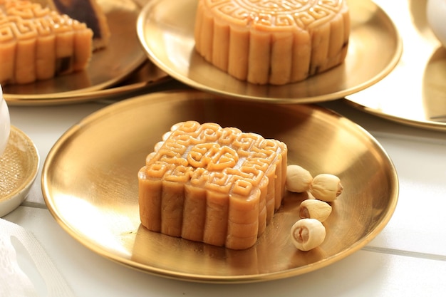 Gâteau de lune de forme carrée Mooncake Dessert chinois Snack pendant le nouvel an lunaire Mid Autumn Festival Concept White Asian Bakery