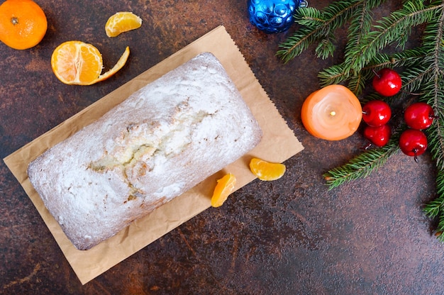 Photo gâteau de noël avec vue de dessus de mandarines