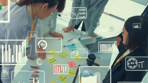 Gens d'affaires en réunion du personnel de l'entreprise avec graphique visionnaire