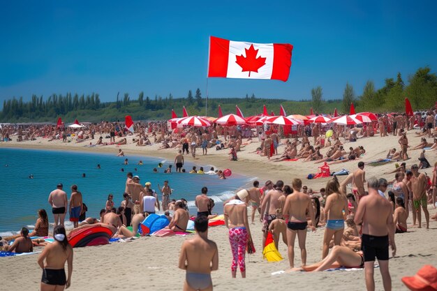 Des gens sur une plage avec des parapluies et un drapeau canadien